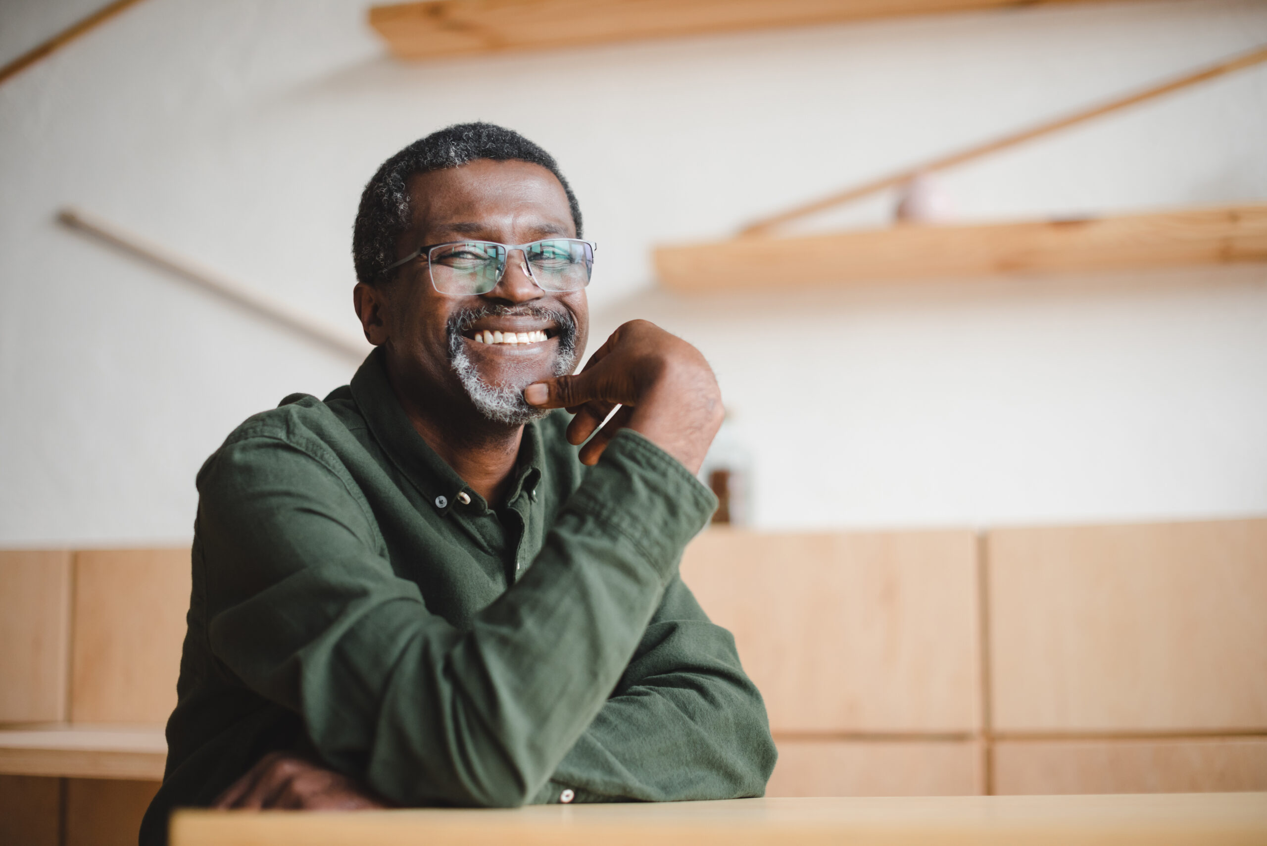 A smiling man reflecting on the benefits of Neubie therapy in Clearwater for chronic pain relief and improved mobility.